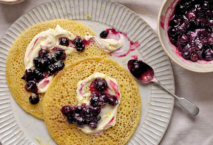 Honey-Buttered Pancakes With Orange Blossom and Blueberry Sauce - Baghrir Recipe