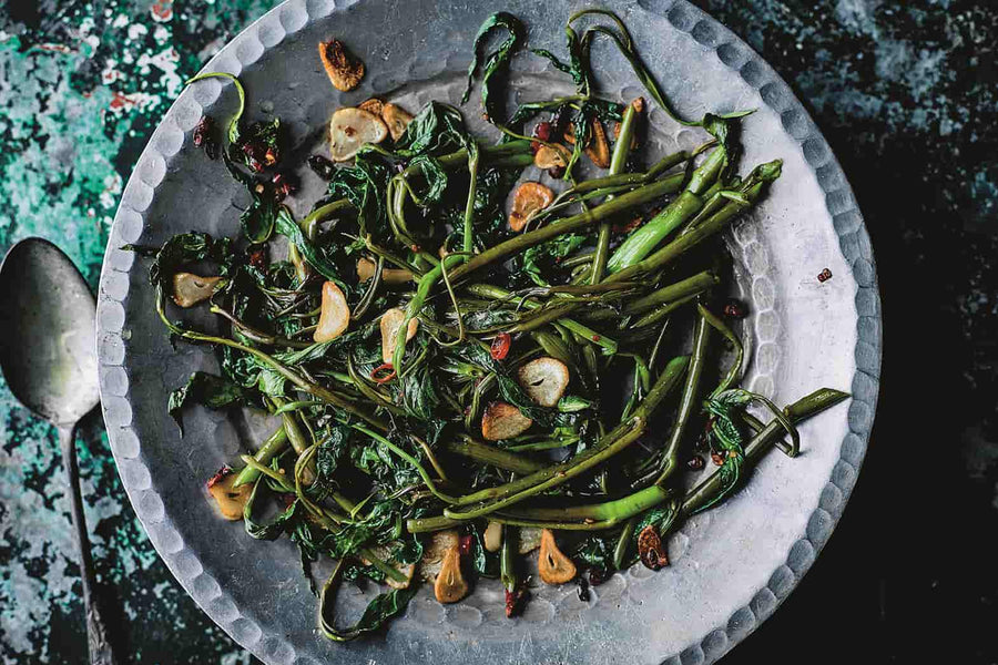 Stir-Fried Morning Glory In a Grey Bowl