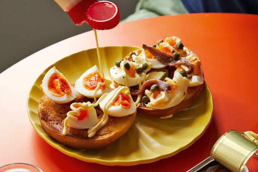 Fudgy Eggs On Toasted Bagels With Anchioves, Mayo, & Capers Recipe