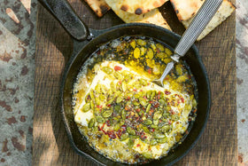Baked Feta with Pumpkin Seeds, Honey & Crispy Cumin Pittas Recipe, by Genevieve Taylor