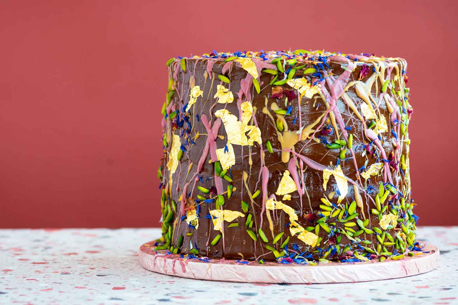pistachio tonka raspberry chocolate ganache birthday cake