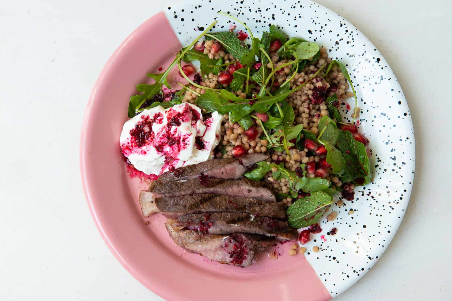 Chargrilled Hibiscus-Marinated Lamb With Rocket, Mint, Giant Couscous and Pomegranate Salad