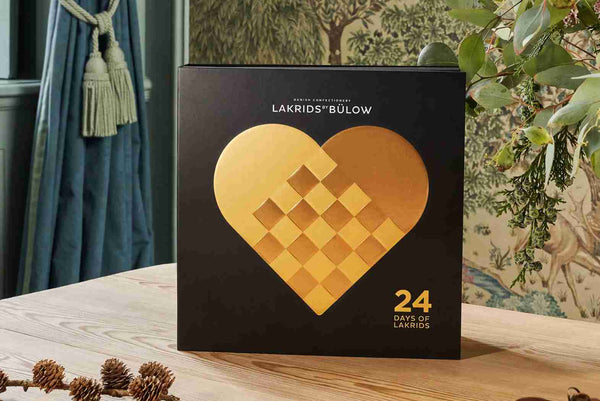 Lakrids Liquorice Advent Calendar 2019 Lifestyle Pack Shot Candles and Table