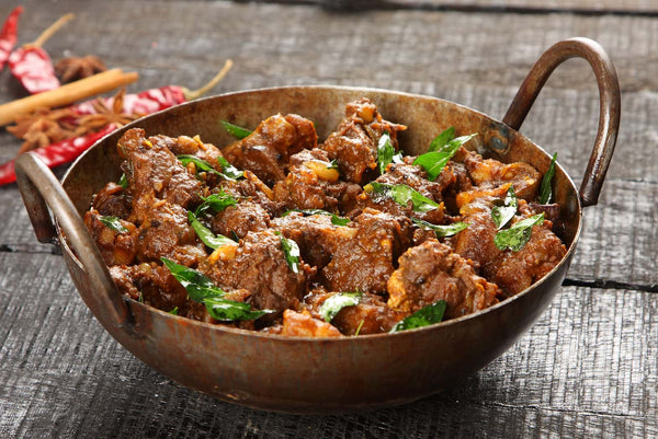 What are the best spices to use in a spicy lamb curry?